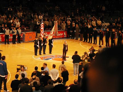 Cathy sings the National Anthem before the Knicks-Nuggets game at Madison Square Garden.
